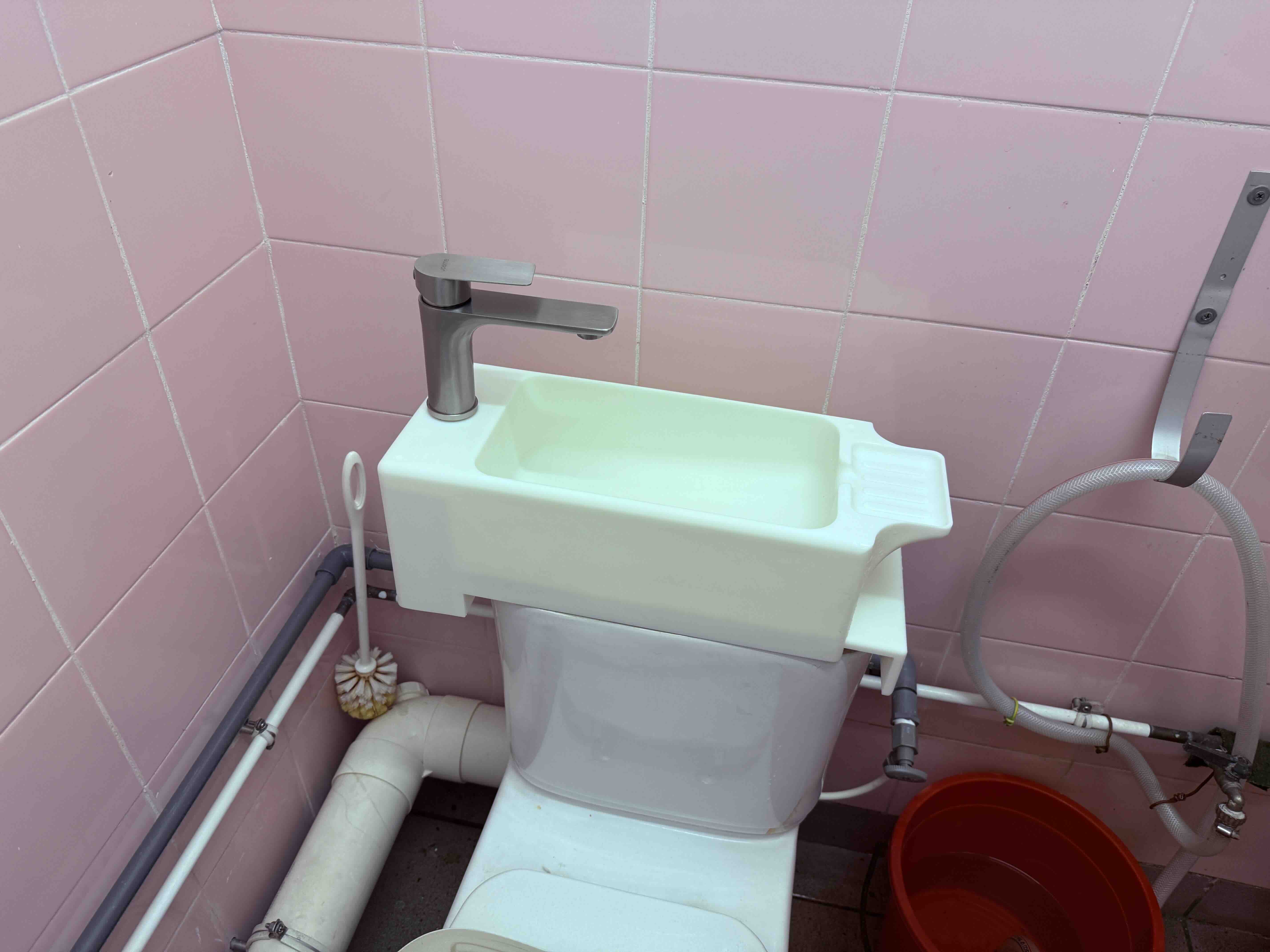 Students developing a water-saving toilet prototype