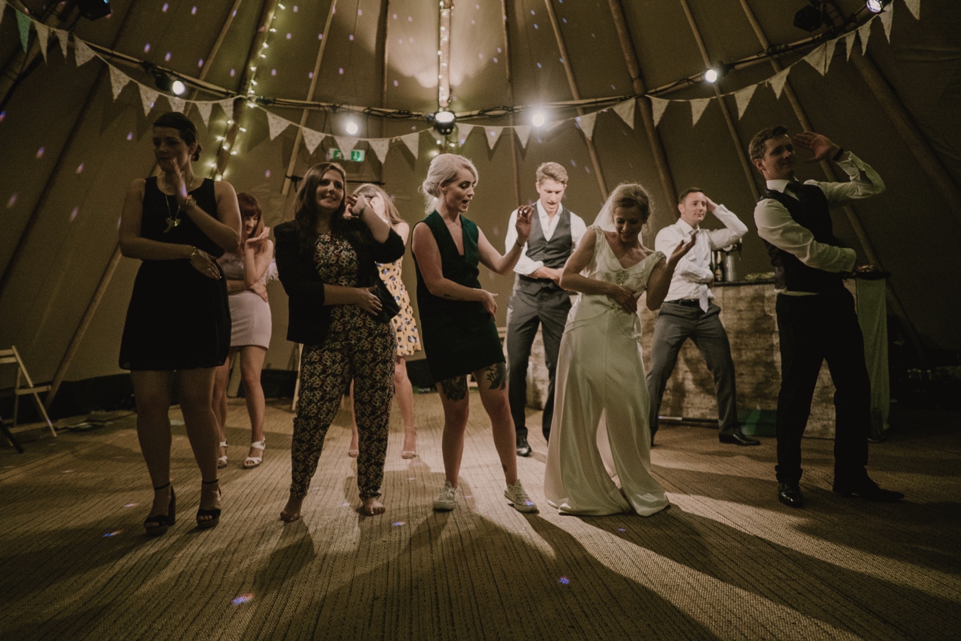 Wedding guests enjoying the celebration together